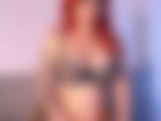 Live cam show with Thayra - Big Tits Mature on StripNow