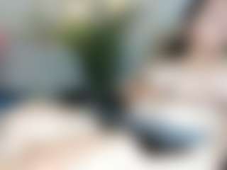 Live cam show with Carla Jones - Living Room on AdultVida.com