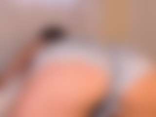 Live cam show with Megan-B - Striptease MILF on Big Tits