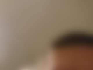 Masturbating