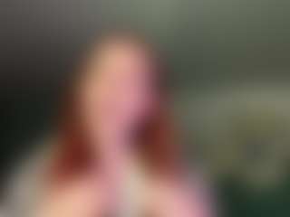 Live cam show with Yuna - Red Hair Shaved Pussy on Camsoda