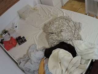 Image 1 of voyeurcam-julmodels-greybed-1, female webcam model,  years old, on live webcam