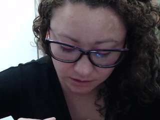 curly-greeneyed webcam