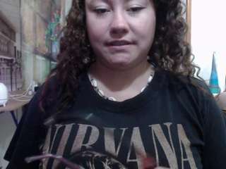 curly-greeneyed webcam