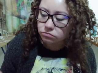 curly-greeneyed webcam