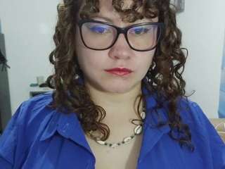 curly-greeneyed