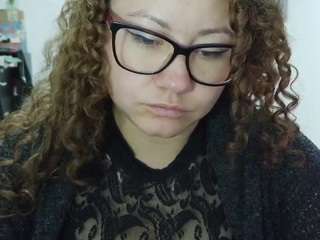 curly-greeneyed