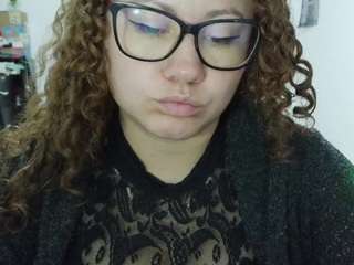 curly-greeneyed