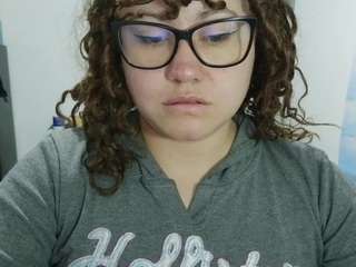 curly-greeneyed