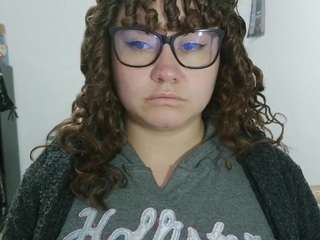 curly-greeneyed