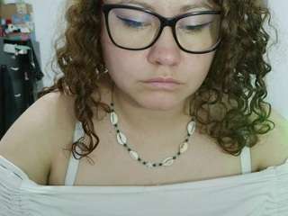 curly-greeneyed