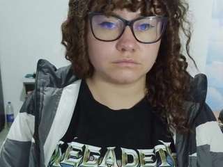 curly-greeneyed