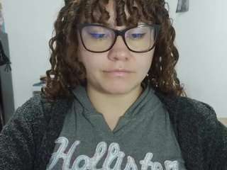curly-greeneyed