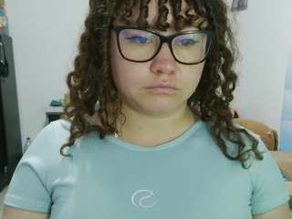 curly-greeneyed