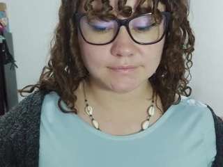 curly-greeneyed