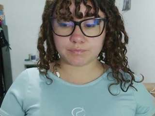 curly-greeneyed