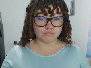 curly-greeneyed