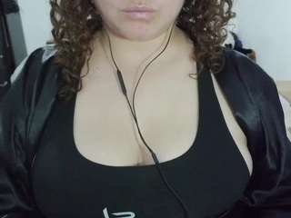 curly-greeneyed