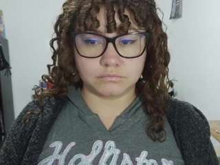 curly-greeneyed