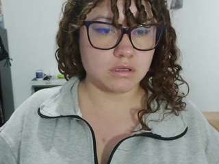 curly-greeneyed