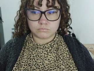 curly-greeneyed
