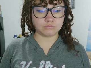curly-greeneyed