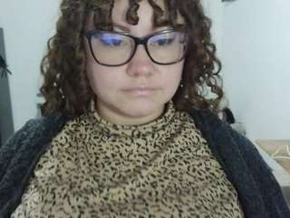 curly-greeneyed