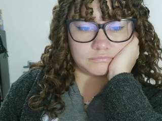 curly-greeneyed