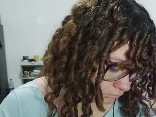 curly-greeneyed