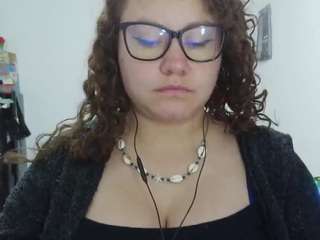 curly-greeneyed