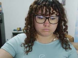 curly-greeneyed