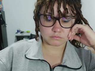 curly-greeneyed