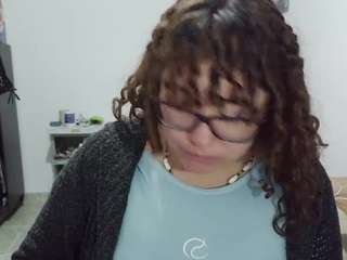 curly-greeneyed