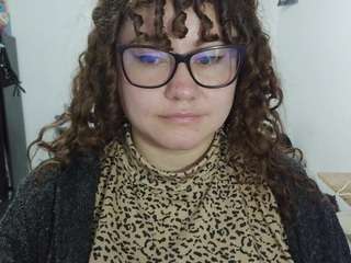 curly-greeneyed