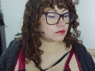 curly-greeneyed