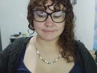 curly-greeneyed