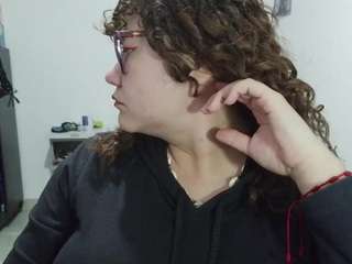 curly-greeneyed