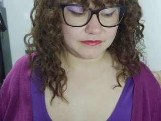 curly-greeneyed