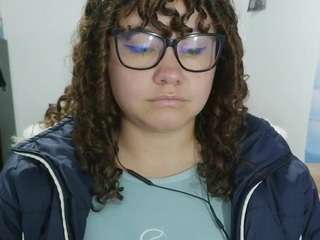 curly-greeneyed