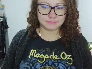 curly-greeneyed
