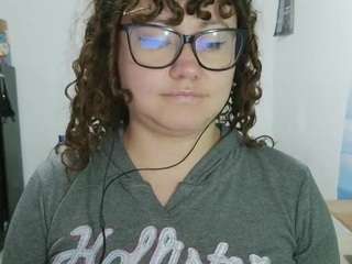 curly-greeneyed