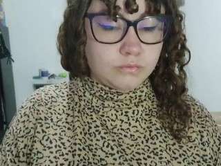 curly-greeneyed