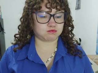 curly-greeneyed