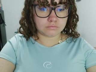 curly-greeneyed