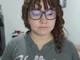 curly-greeneyed