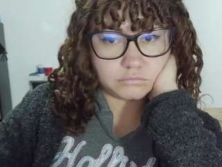 curly-greeneyed