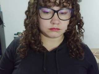 curly-greeneyed