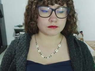 curly-greeneyed