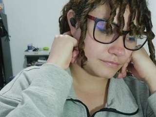 curly-greeneyed