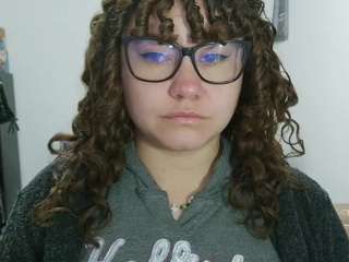 curly-greeneyed